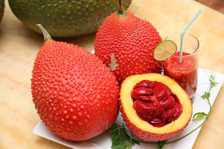 Mùa đông gấc chín rộ, lưu ngay mẹo bảo quản để đồ xôi hay nhuộm màu mứt Tết đều tươi ngon như mới hái - Ảnh 1.